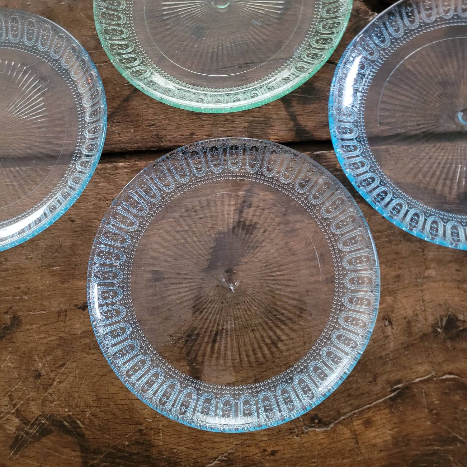 6 molded glass plates – 5 bluish, 1 aqua green