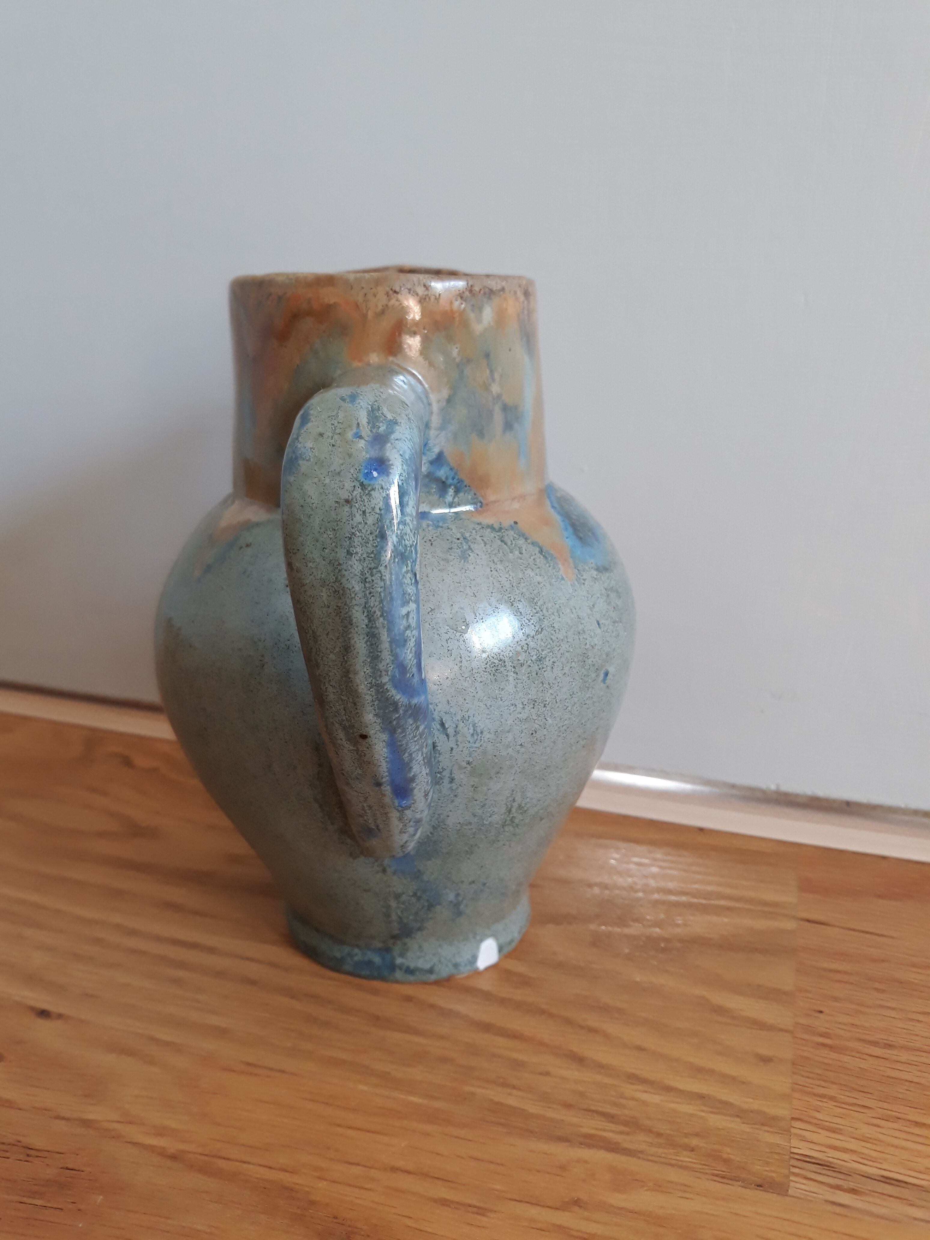 Pitcher ceramic  tones blue, green and caramel