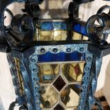 Large antique wrought iron lantern with stained glass windows