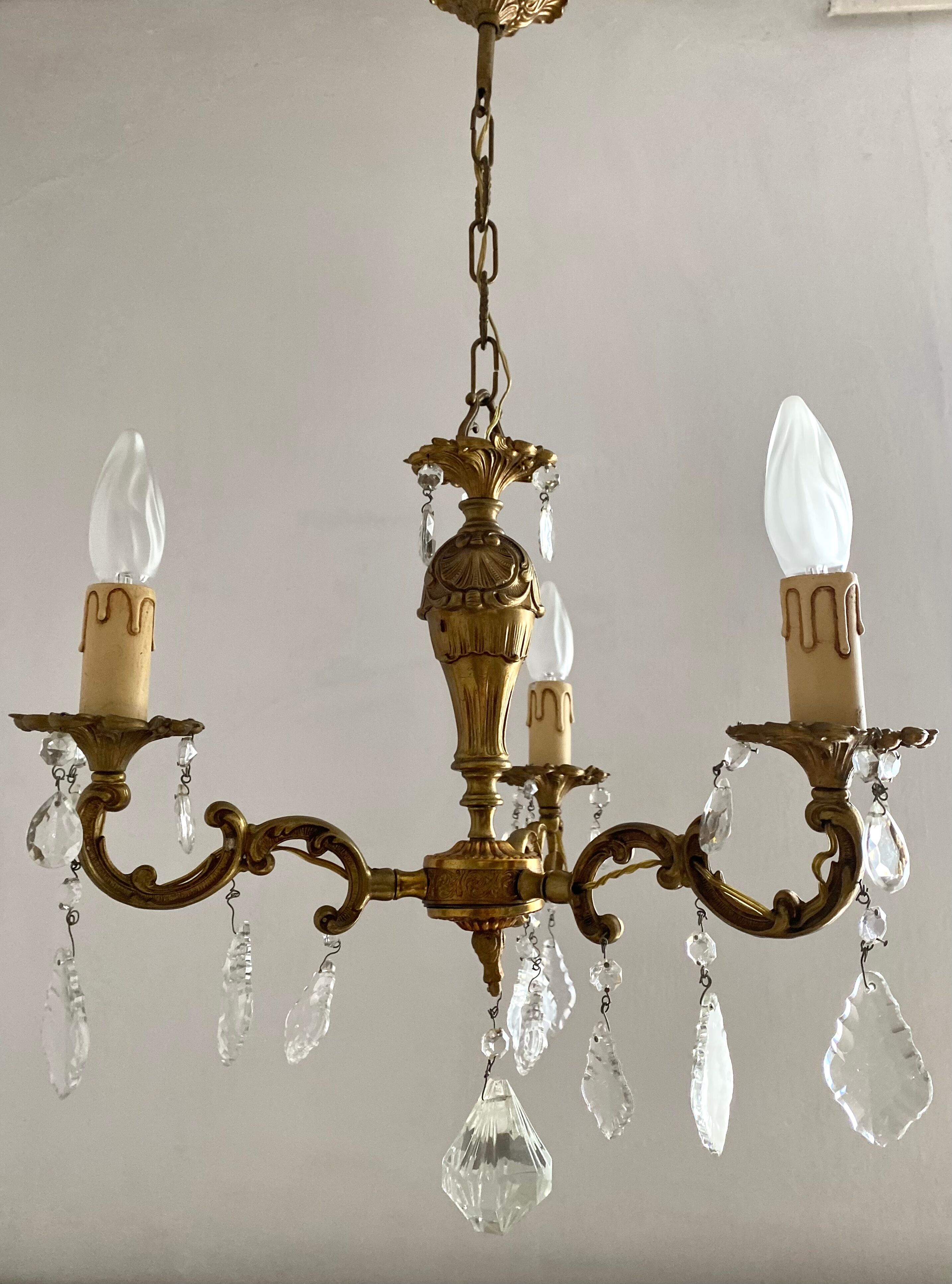 Chandelier with tassels and brass