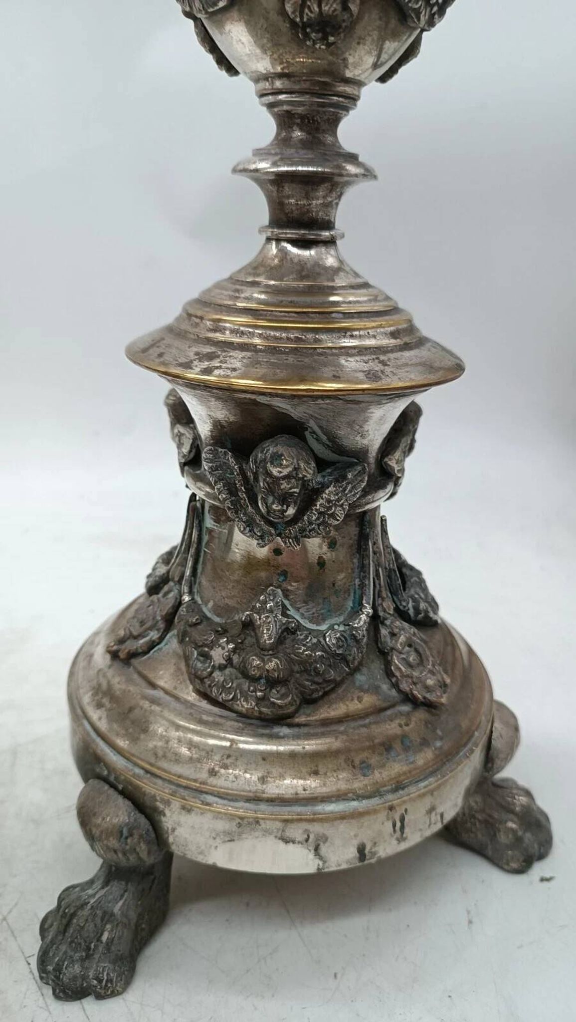 Pair of silver-plated bronze candlesticks in the Empire style, early 19th century, height 70 cm