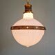 Large Art Deco pendant light in milk glass and brass, 1920s