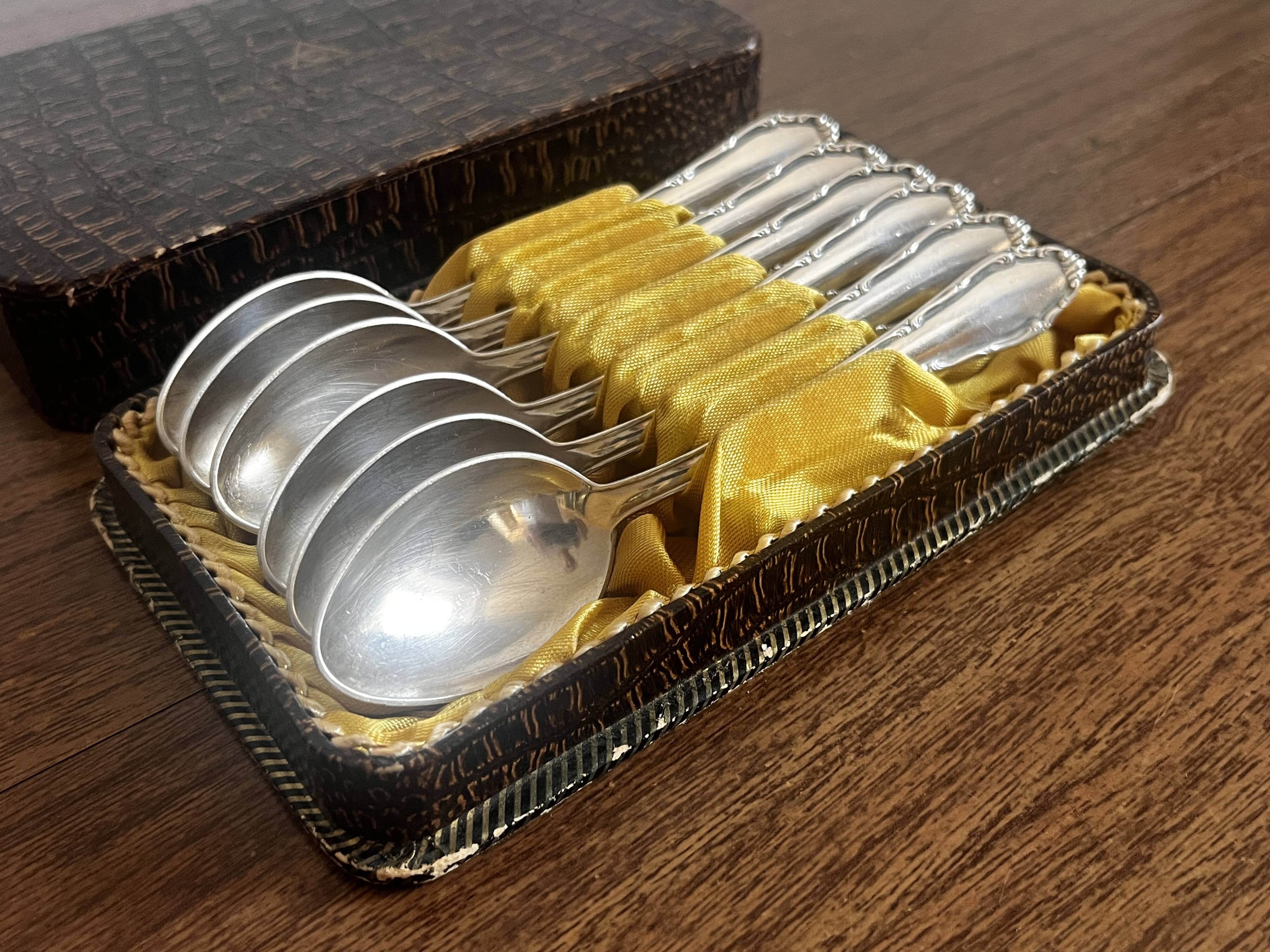 Small silver-plated metal spoons
