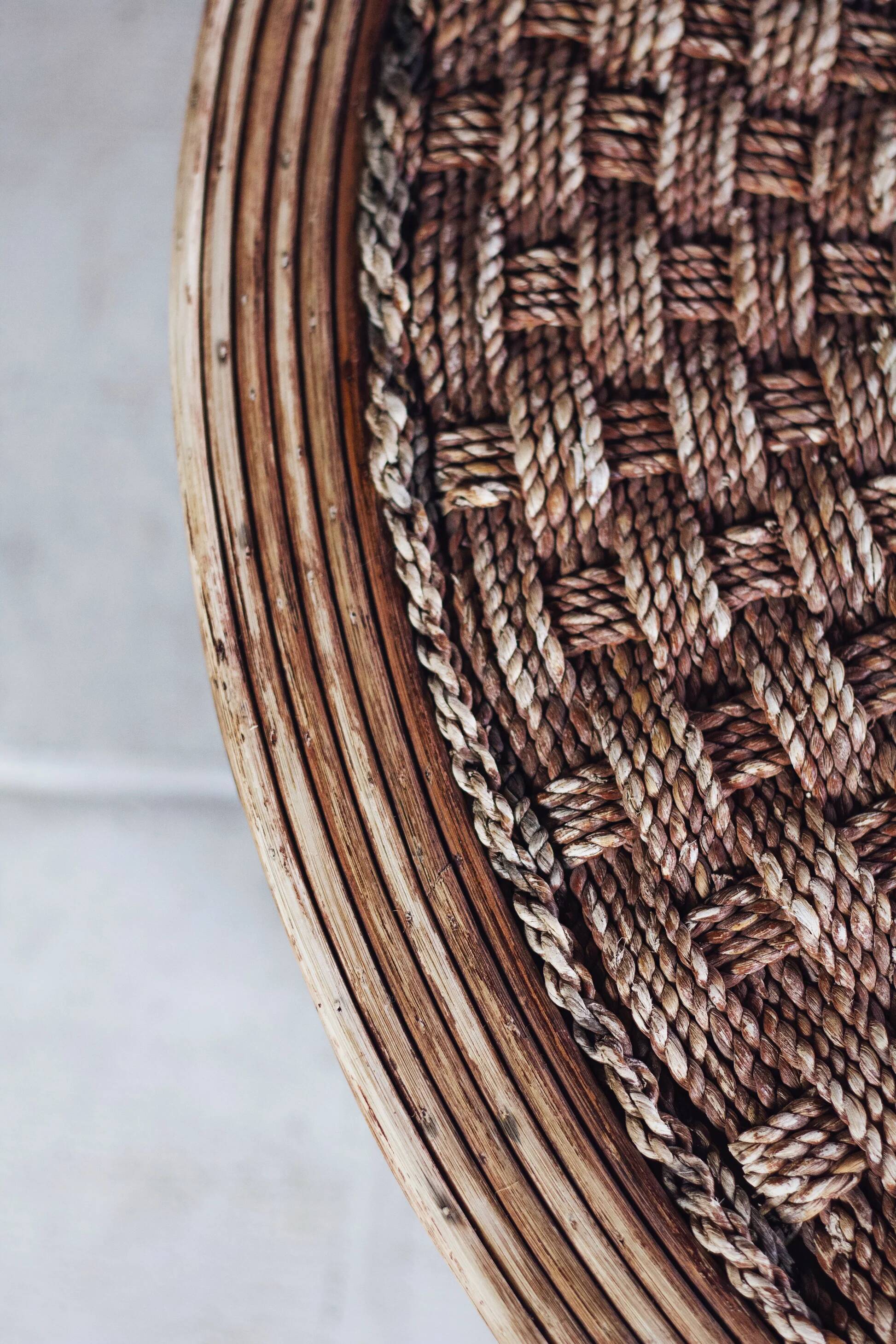 Round coffee table in braided cord and rattan, 1970.