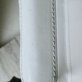 Armchair in chrome and leather