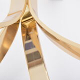 Gold Colored Mid-Century Modern coffee table with smoked Glass top