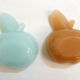 Pair of Apple opalin ashtrays
