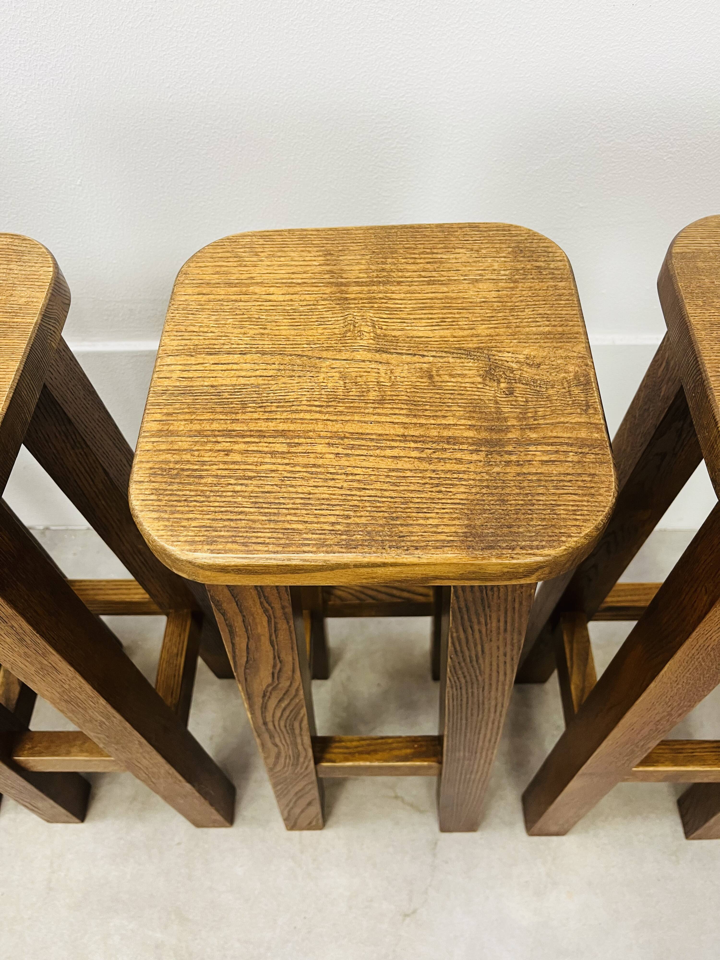8 solid wood bar stools in brutalist style