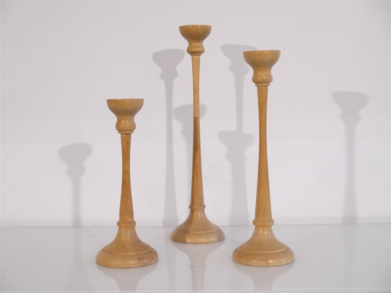 Set of Scandinavian wooden candle holders 1960