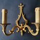 Three Louis XVI bronze wall sconces by Lucien Gau, Paris, antique.