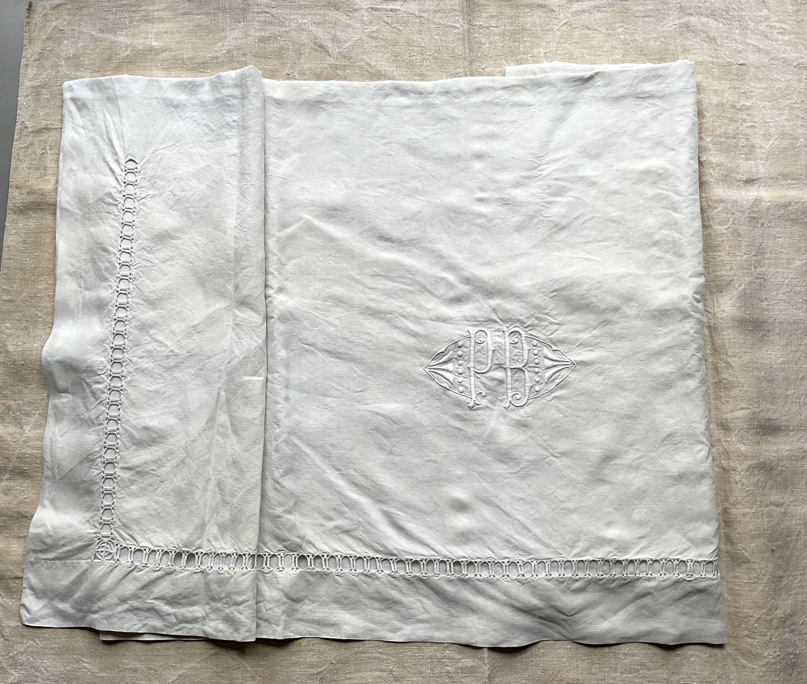 Old hand-embroidered linen sheet