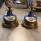 Pair of xixth candle holders, in bronze and enamelled porcelain
