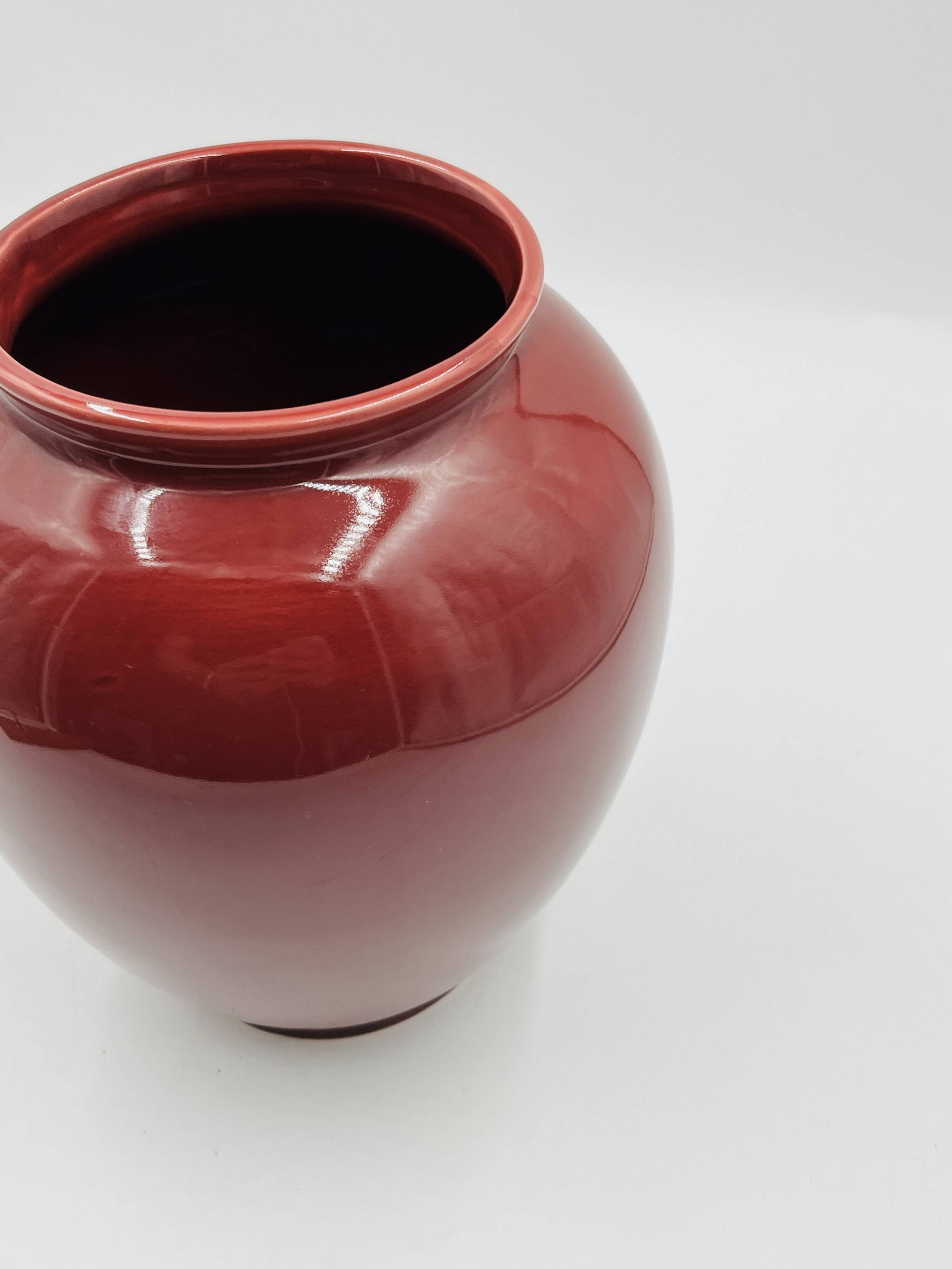 Vintage vase in glazed burgundy ceramic