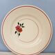 Set of 11 hand-painted earthenware plates
