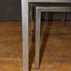 Coffee table and its steel and glass wiggles around 1970