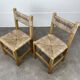 2 straw and wood chairs in brutalist style