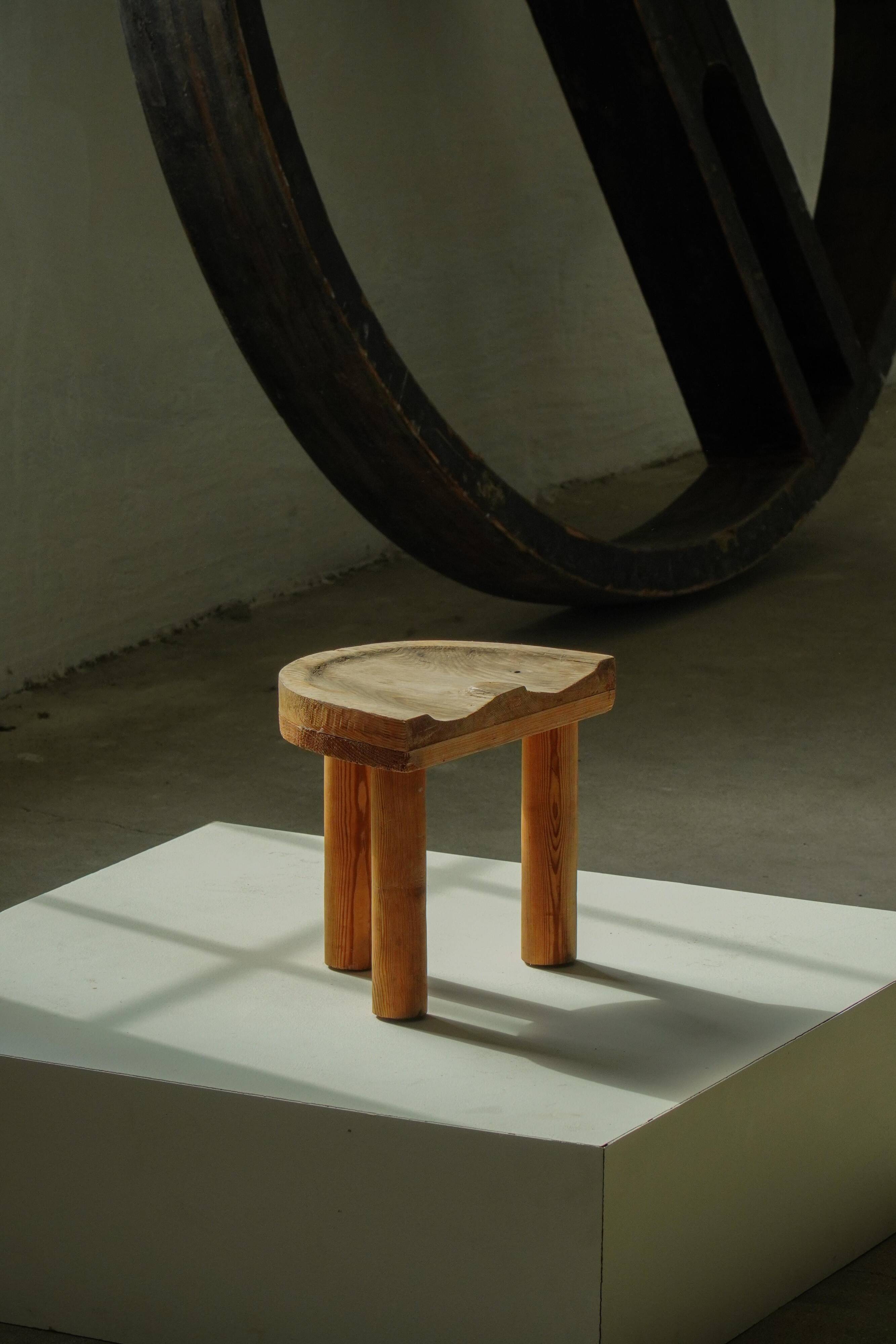 Carved pine stool, Swedish folk art, mid-20th century, 1950s.