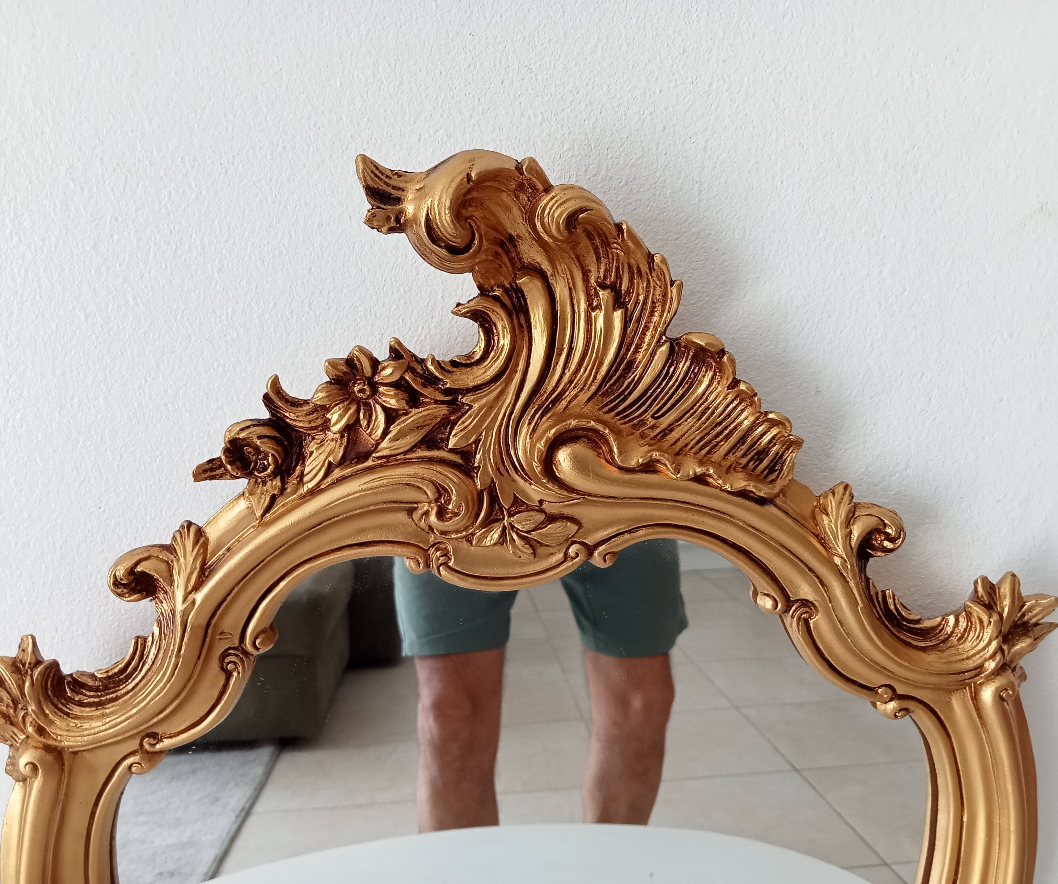 Vintage rococo mirror in gilded resin