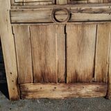 Oak door with clover-shaped oculus