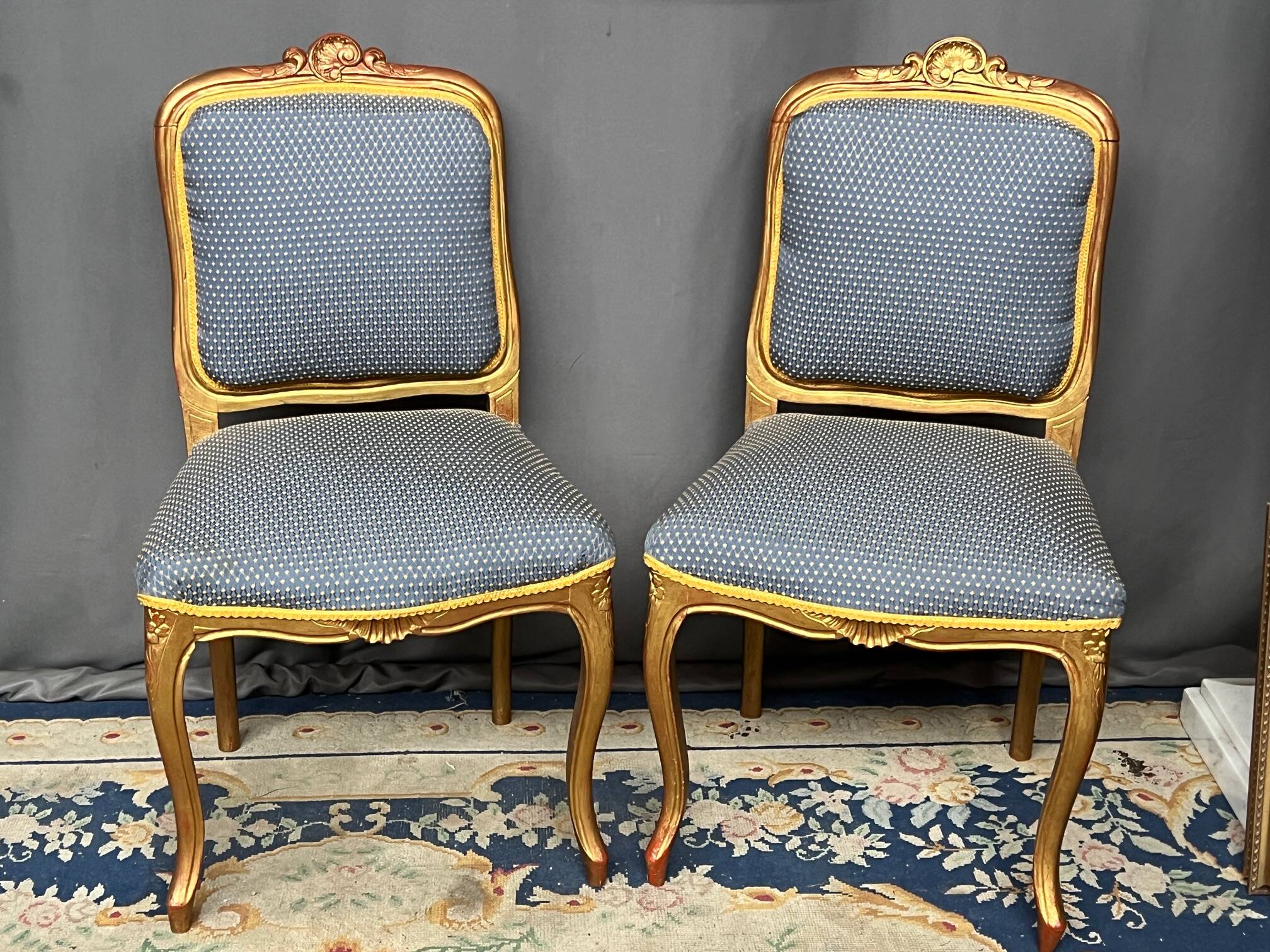 Pair of Louis XV style chairs with gilt frames.