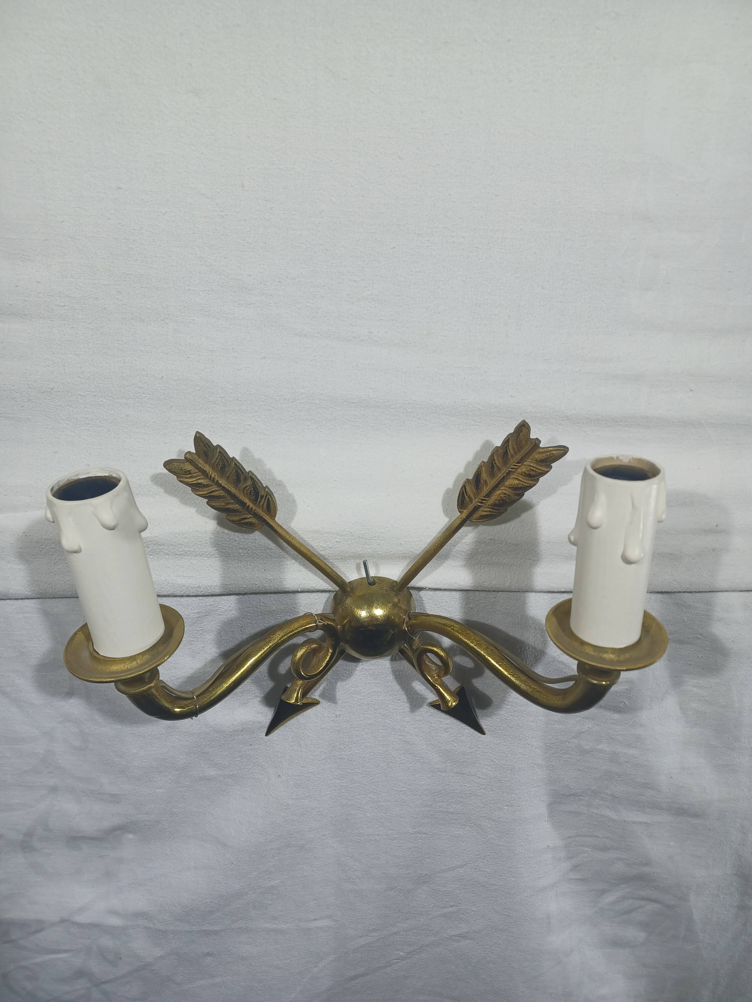 Empire style arrow wall light