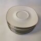 Set of 8 Georges Boyer Limoges porcelain saucers