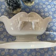 Antique porcelain sauce boat with bamboo pattern.