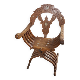 Syrian folding armchair in carved wood inlaid with mother-of-pearl