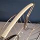 Vintage gold metal magazine rack