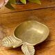 Apple-shaped brass ashtray