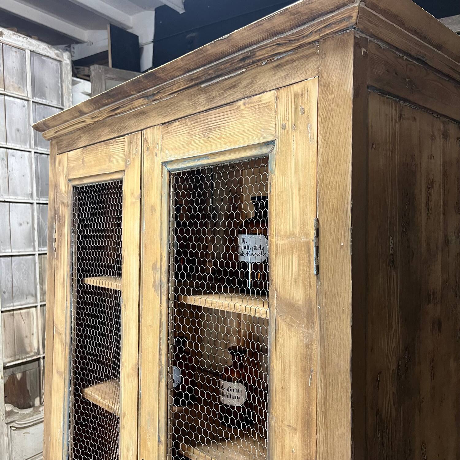 Old patinated mesh cupboard