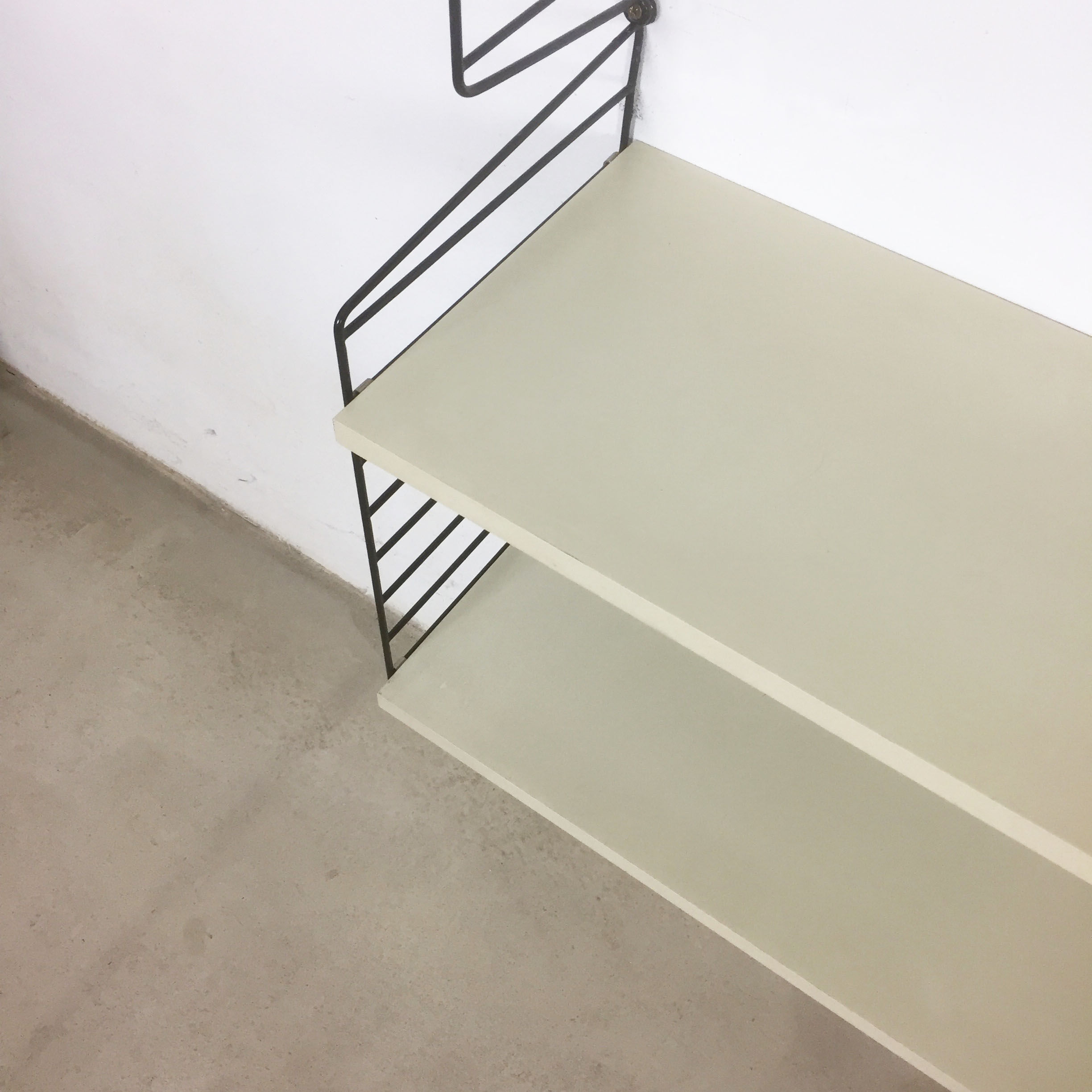 Swedish white shelves by Nisse Strinning for String of the 1960s