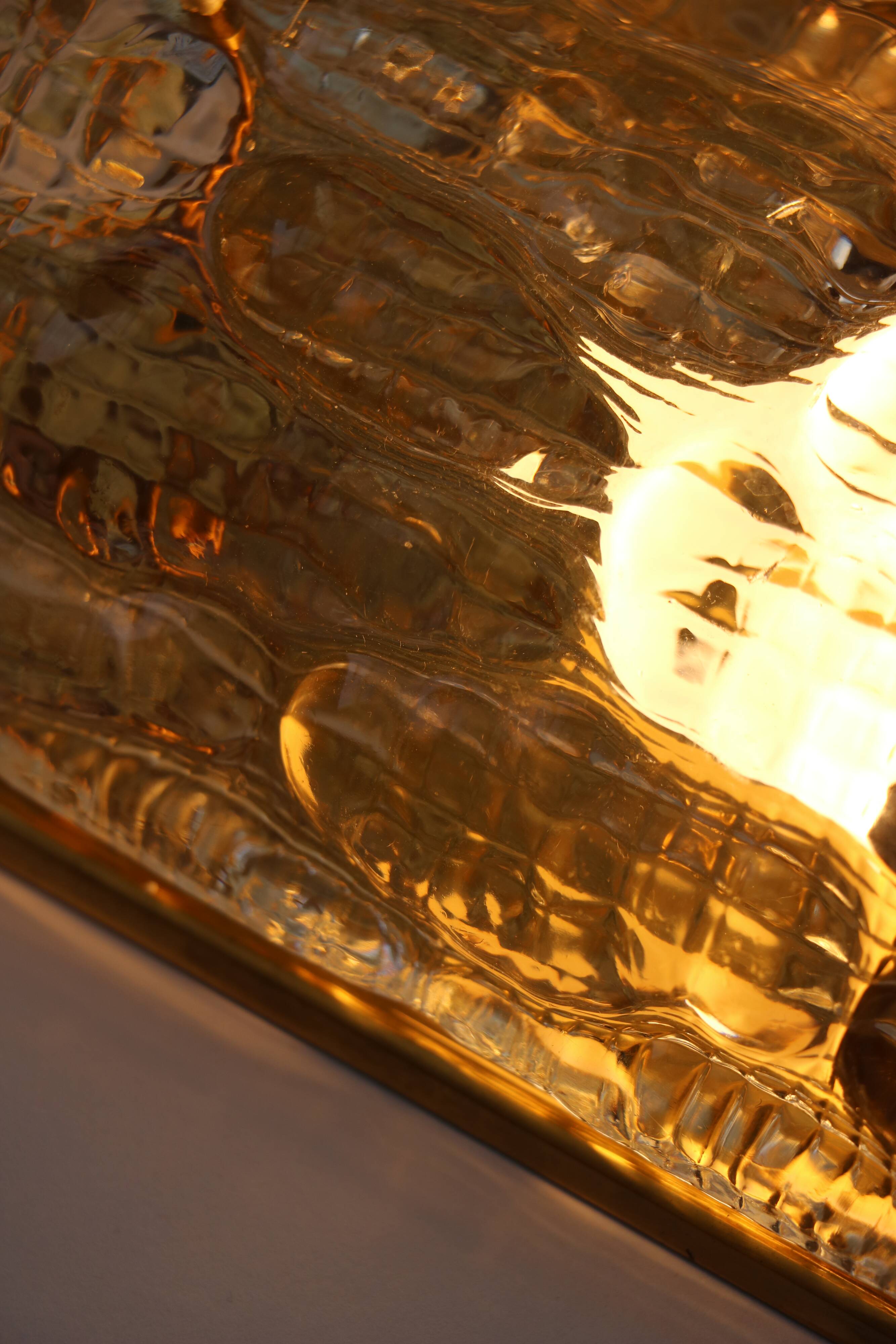 Pair of glass and brass wall lights by Carl Fagerlund for Orrefors, 1960.