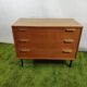 Wooden chest of drawers with gilded handle