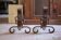 Brutalist cast iron fireplace grates in the shape of a belt, decor.