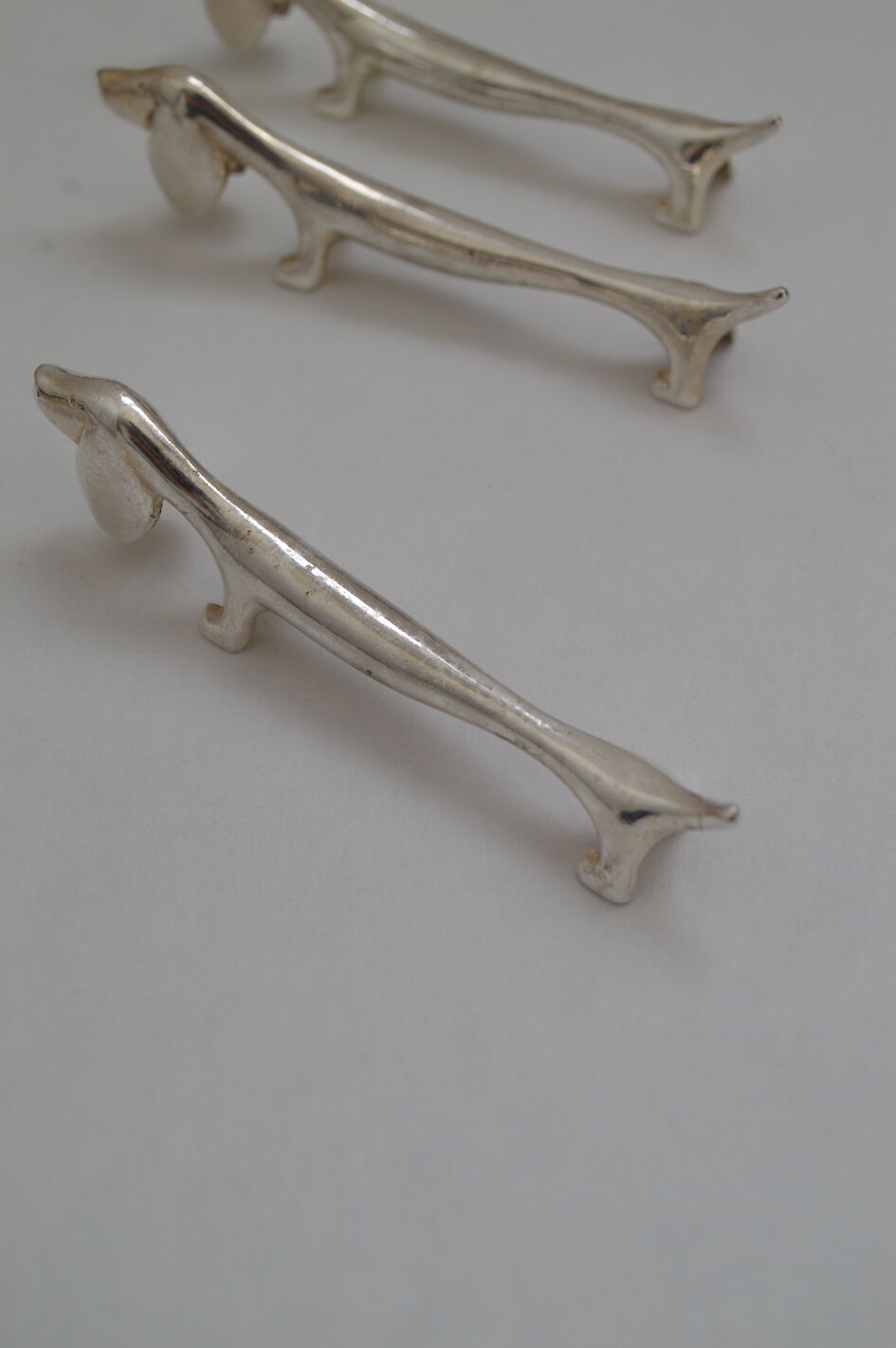 6 silver plated basset knife holders