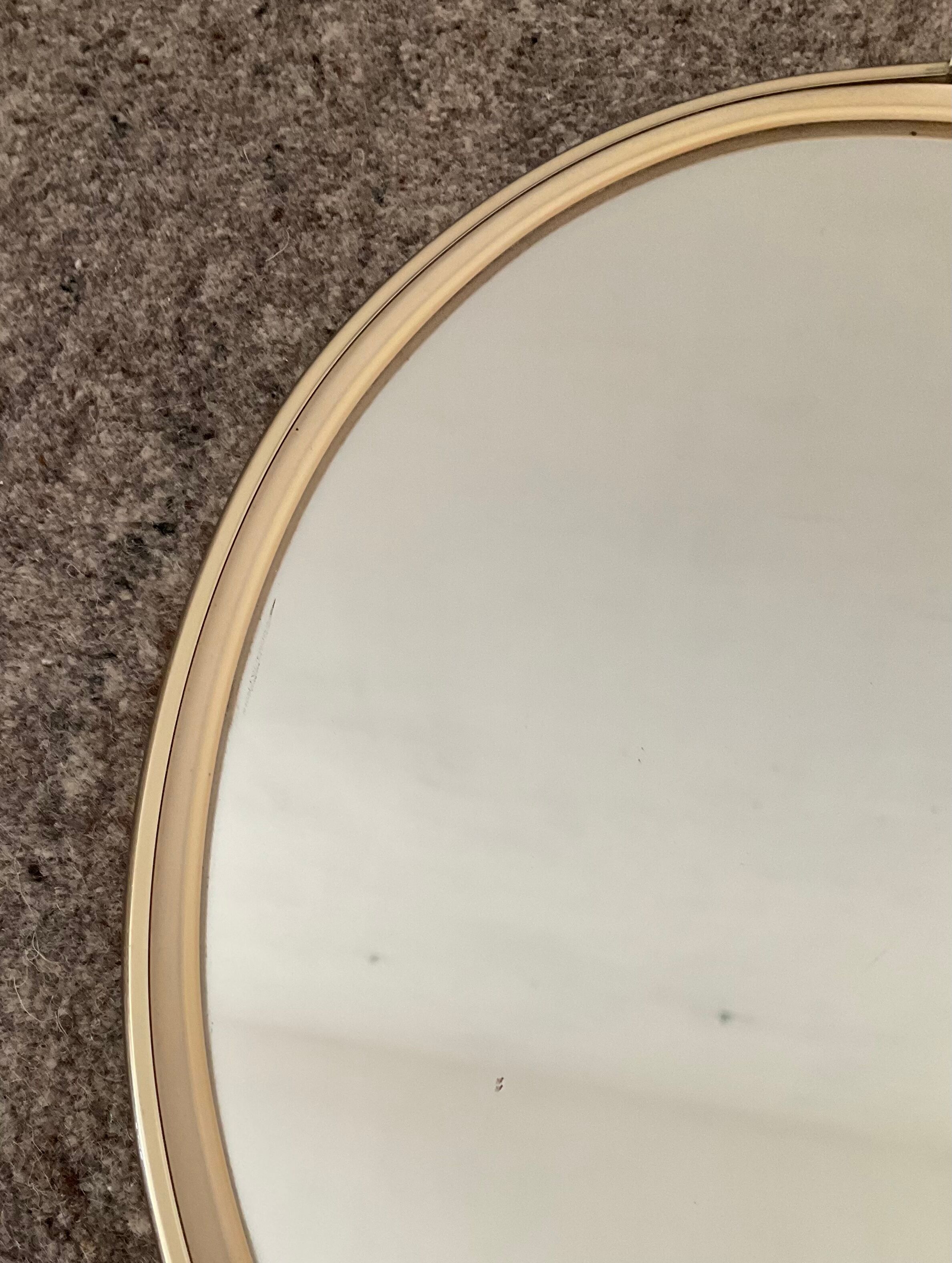 Vintage oval mirror from the 60s and 70s