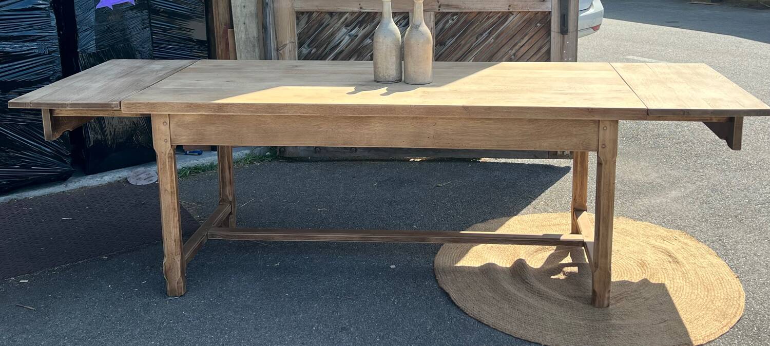 Large renovated antique table with 2 extensions in raw solid oak.