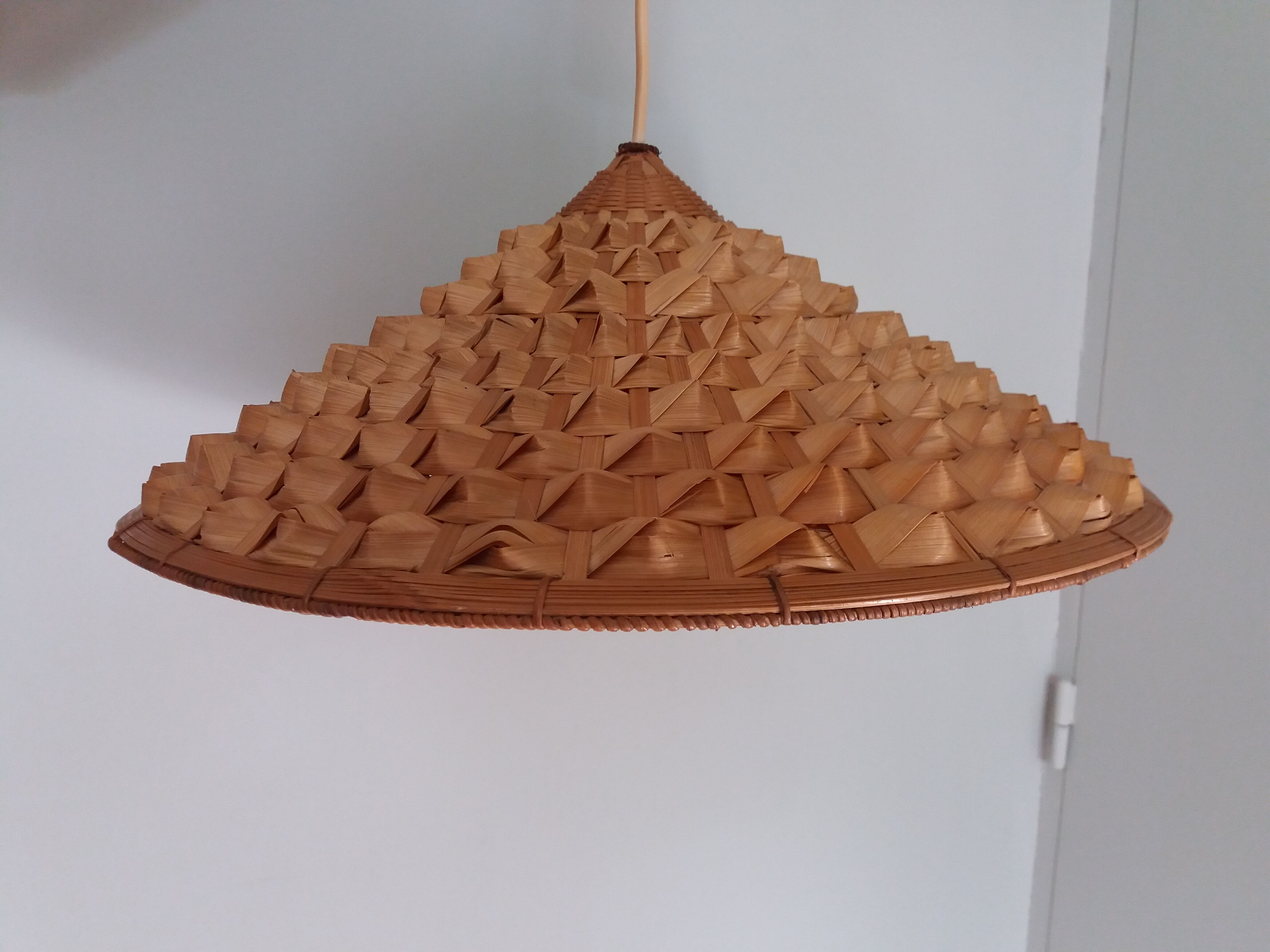 Conical shaped rattan suspension