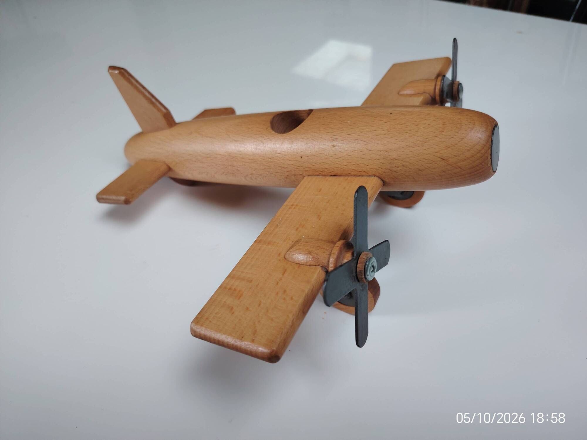 Vintage twin-engine aircraft in solid beech - Moulin Roty (1990s)
