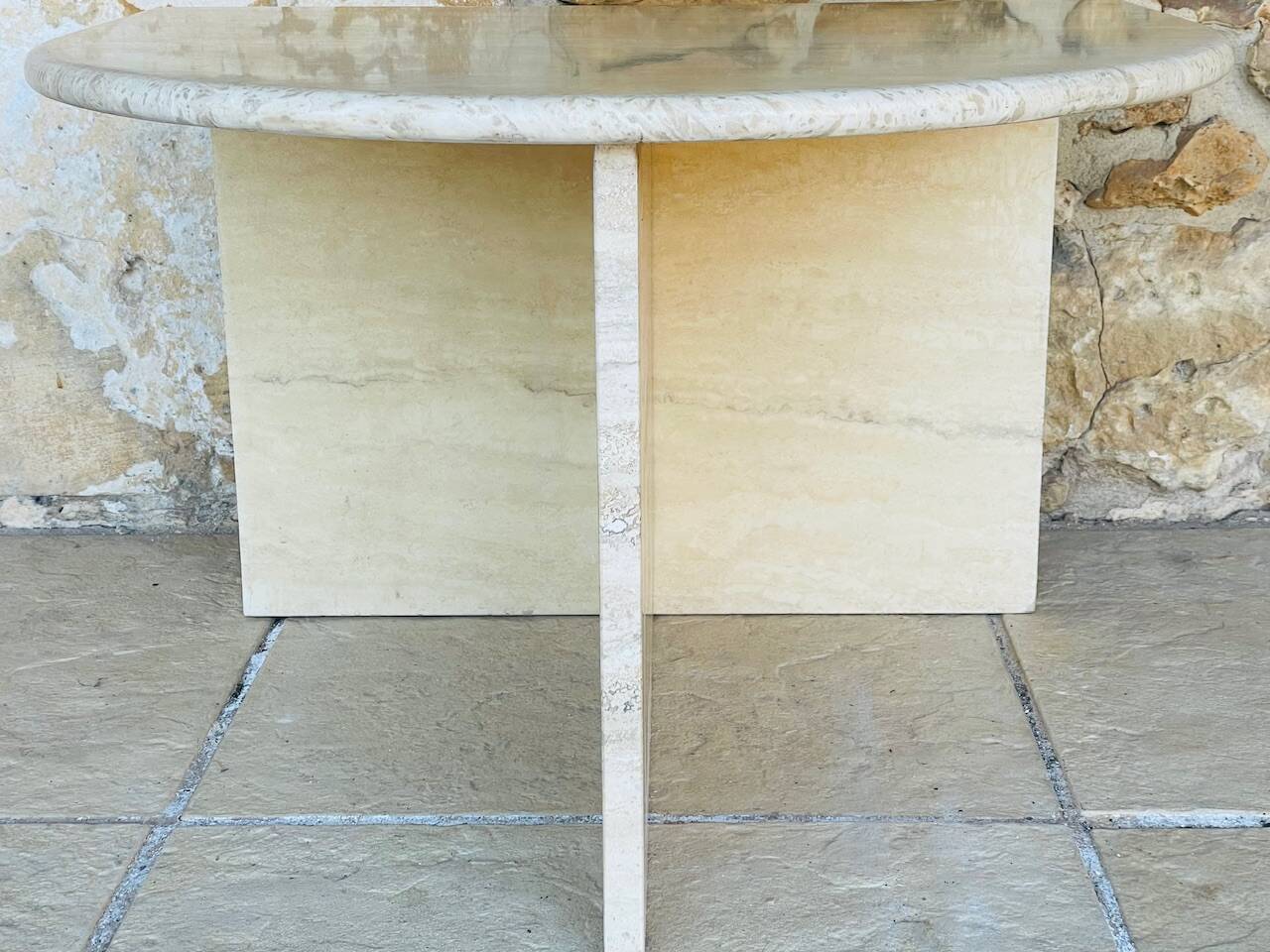 Vintage side table in travertine, circa 1980s.
