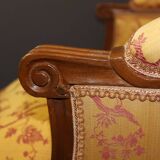 Pair of Louis XVI Bergères in walnut, late 18th century.