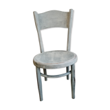 White antique children's chair in patinated wood