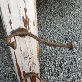 antique coat rack with 4 cast iron hooks