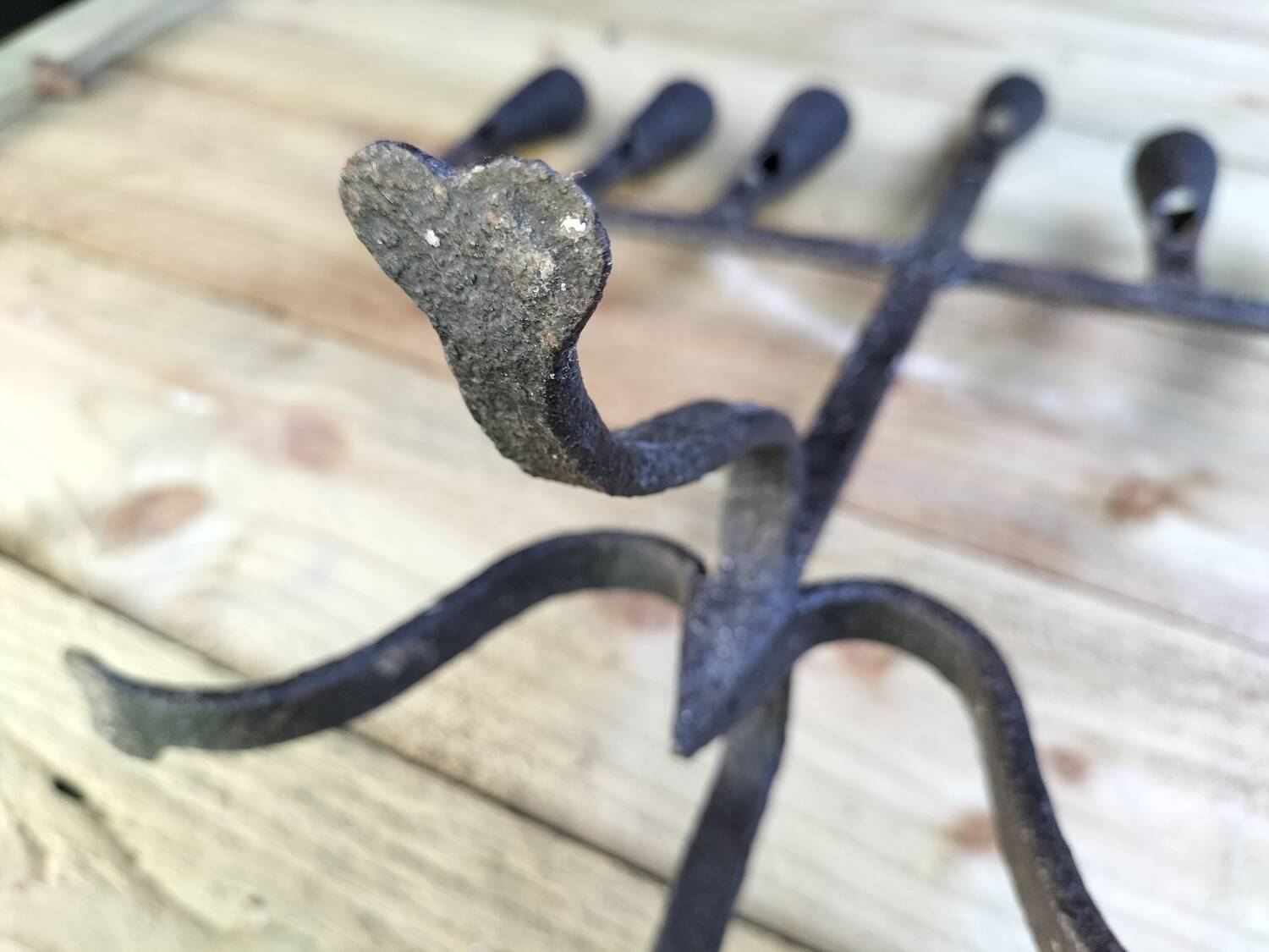 Brutalized wrought iron candle holder