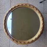 Large round mirror in Spanish gilded carved wood