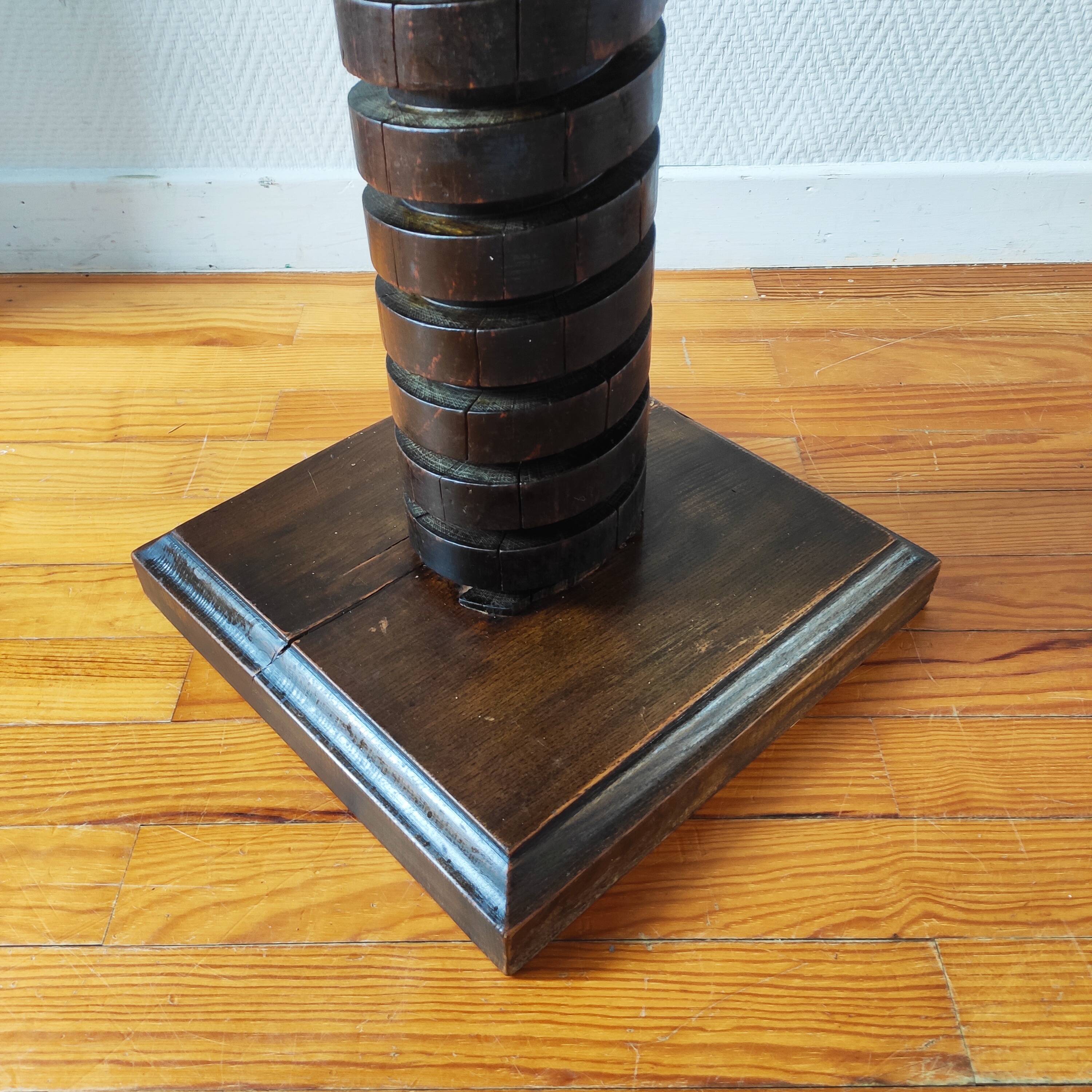 Brutalist column – old Burgundy press screw