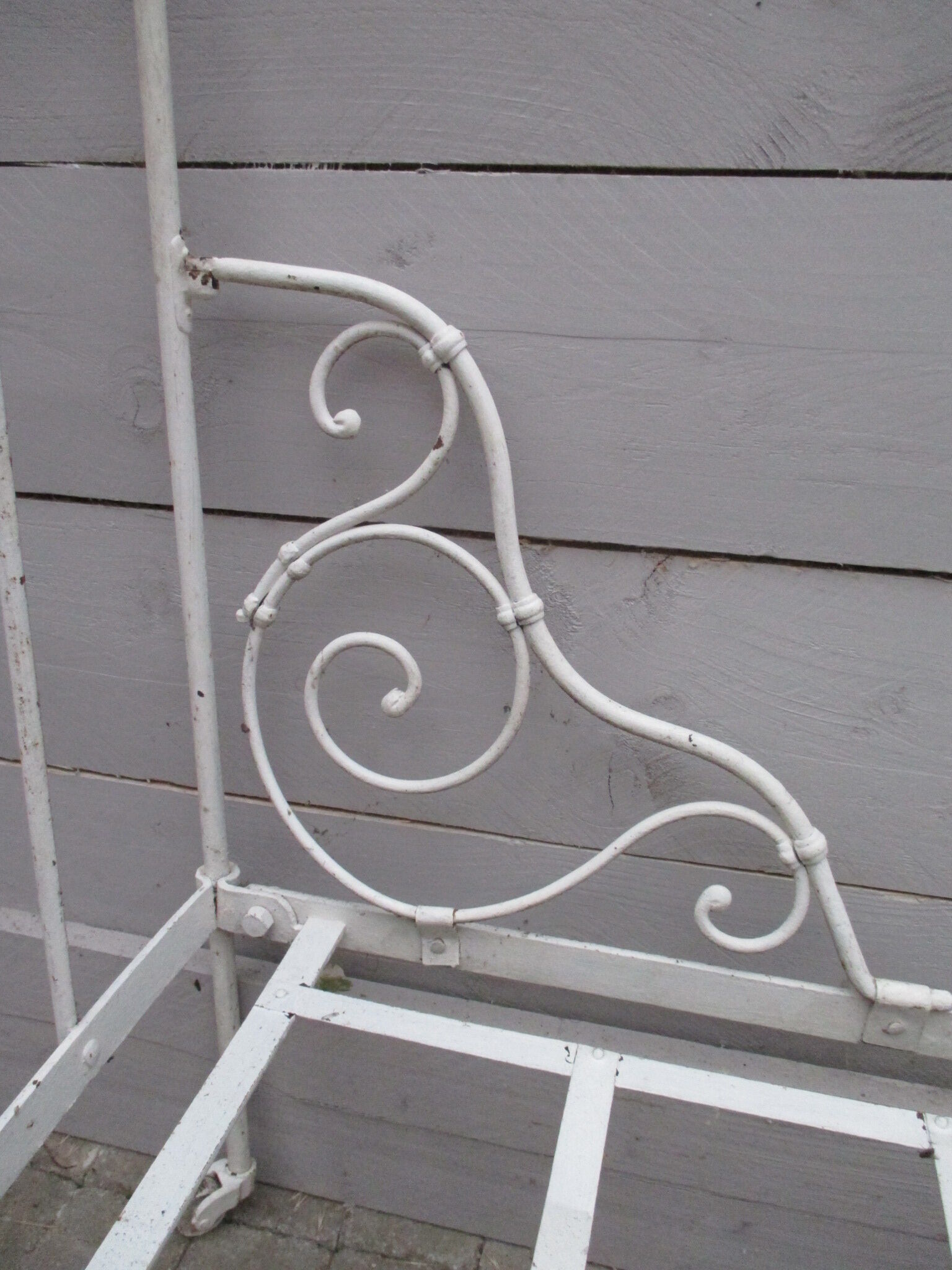 Folding wrought iron bed