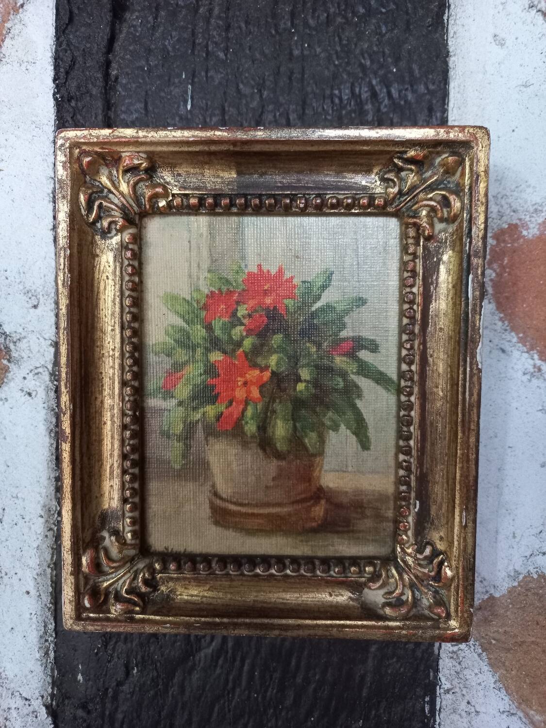 Bouquet of flowers in golden wood