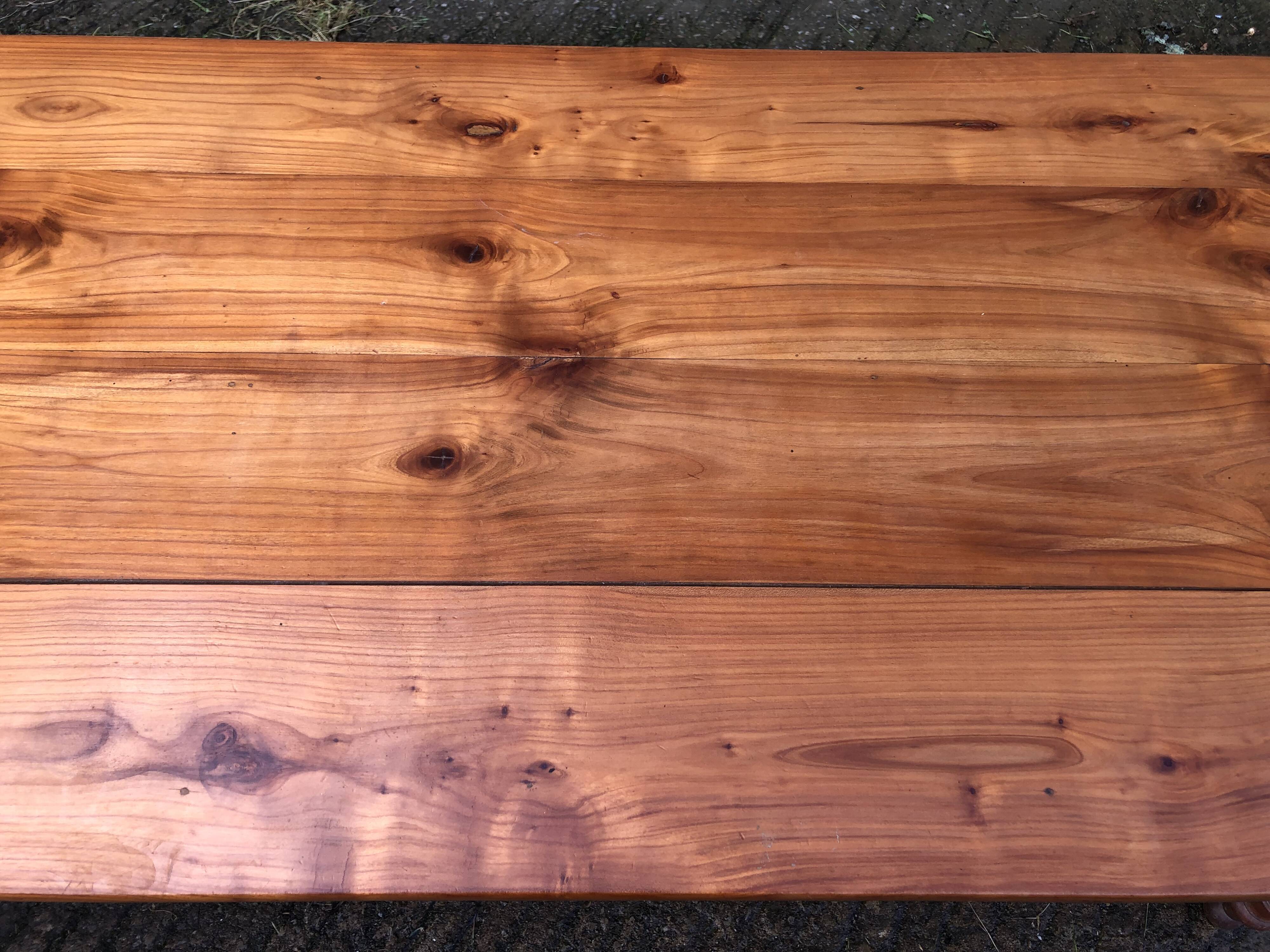 Antique farmhouse table in solid cherry wood in Louis Philippe style.